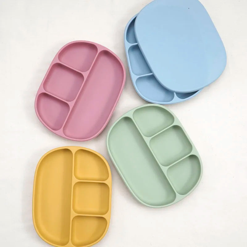 Soft silicone dinner plate with four compartments for structured, sensory-friendly mealtimes