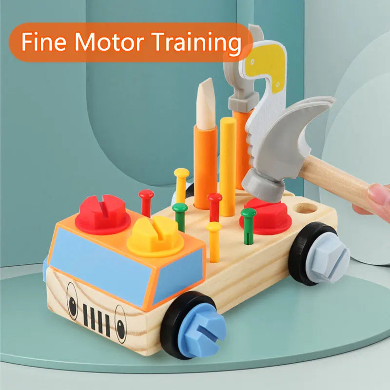 Toy tool set with a hammer and various tools on a wooden base, labeled 'Fine Motor Training'.