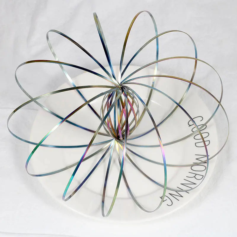 Toroflux flow ring spiralling smoothly down adult arm for tactile focus