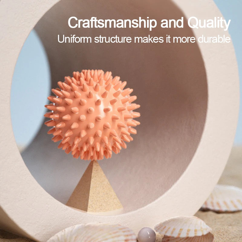Pink textured ball with 'Craftsmanship and Quality' text on a natural background
