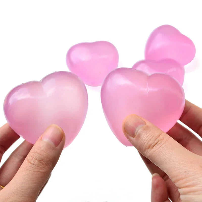 Squishy colour shift heart toy designed for discreet stimming and tactile feedback