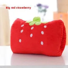 Red strawberry-shaped pouch with a green leaf on a white surface