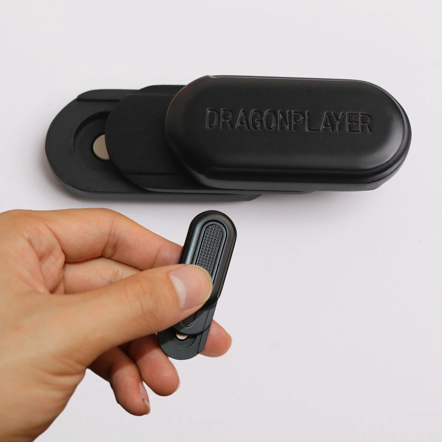 Discreet stim device with sliding motion for emotional grounding and focus