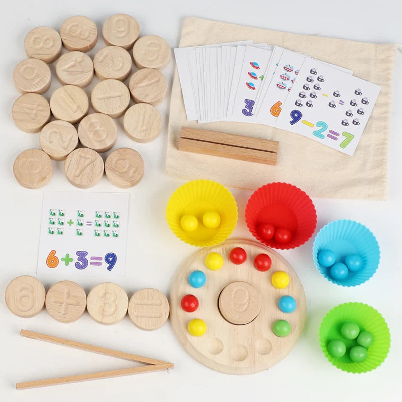 Educational math toy set with wooden numbers, colorful compartments, and cards on a white background
