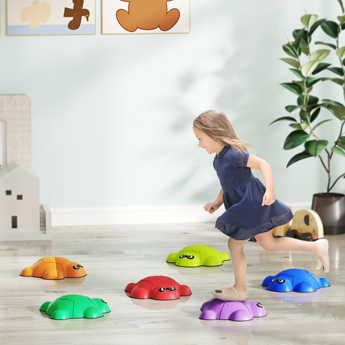 Children’s balance path created with stackable river stones in vibrant shades