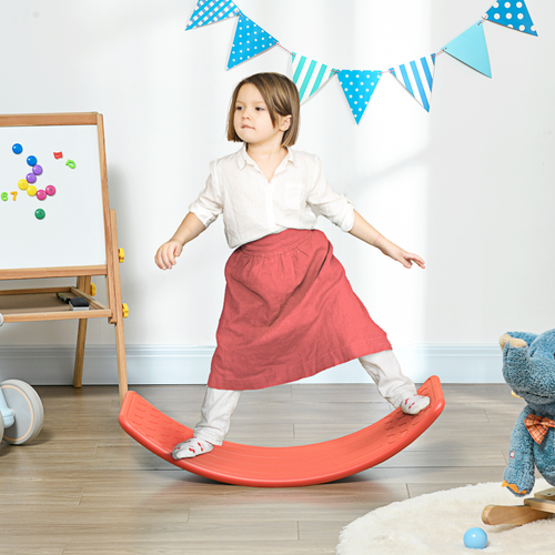 Child standing on Montessori-style wobble stepping stone promoting proprioceptive input.