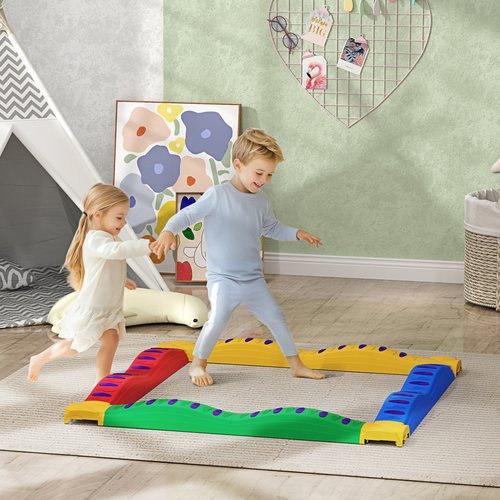 Child navigating balance circuit with undulating beam heights and textured surface dots
