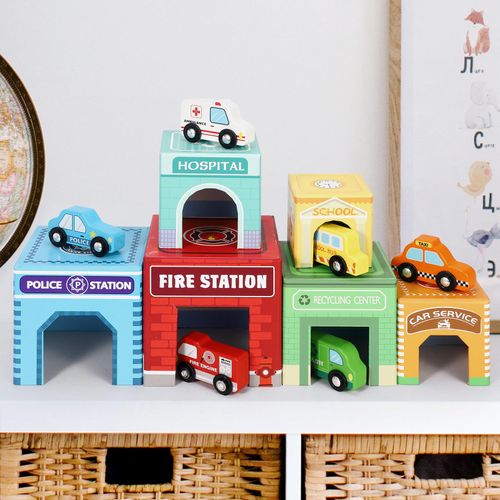 Close-up of stacking puzzle set with multi-level cubes and vehicle play elements for early coordination