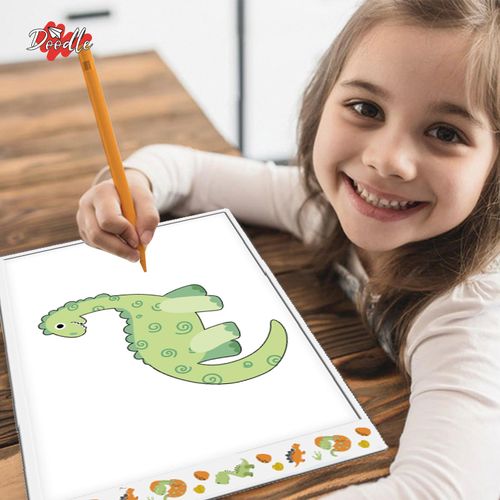 Child using tracing pad with dinosaur artwork, regulating focus through visual-motor activity