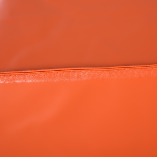 Close-up of leather-textured foam block with smooth corners designed for safe active play