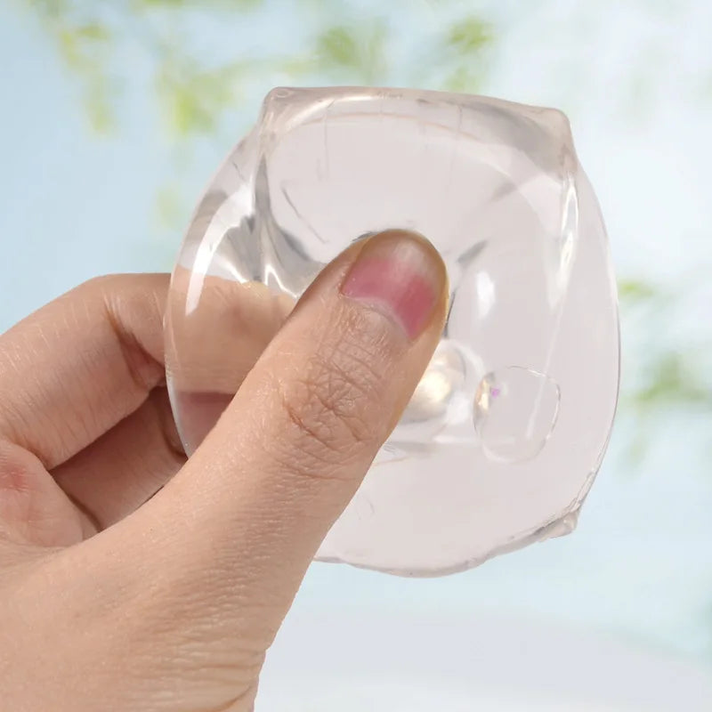 Squishy transparent stim toy with sequins for neurodivergent regulation