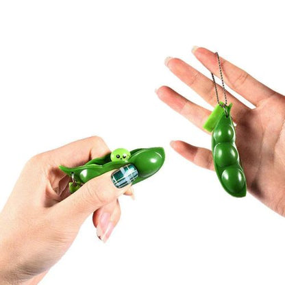 MEADE Peapod fidget keychain showing soft silicone peas designed for tactile stress relief.