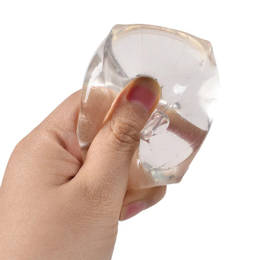 Slow-rebound sequin-filled ice cube squishie for calming sensory input