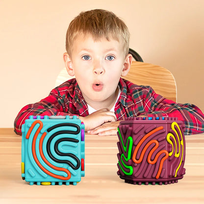 Child engaging with textures and puzzles on sensory-friendly activity board