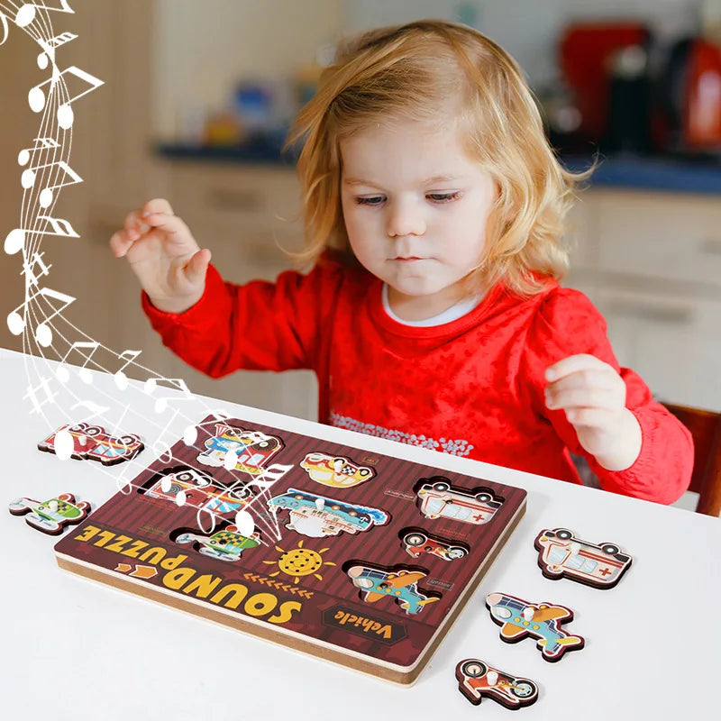 Child playing with a wooden sound puzzle in a kitchen setting