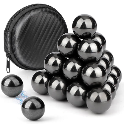 Set of black metal balls with a black case on a white background