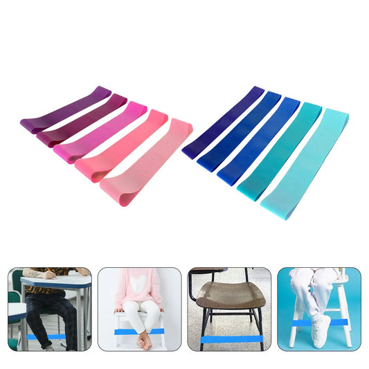 Stretchy chair bands shown fitted to school chair legs with child feet pressing against band for quiet fidget movement