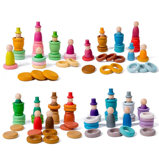 Colorful wooden toy figures and rings on a white background