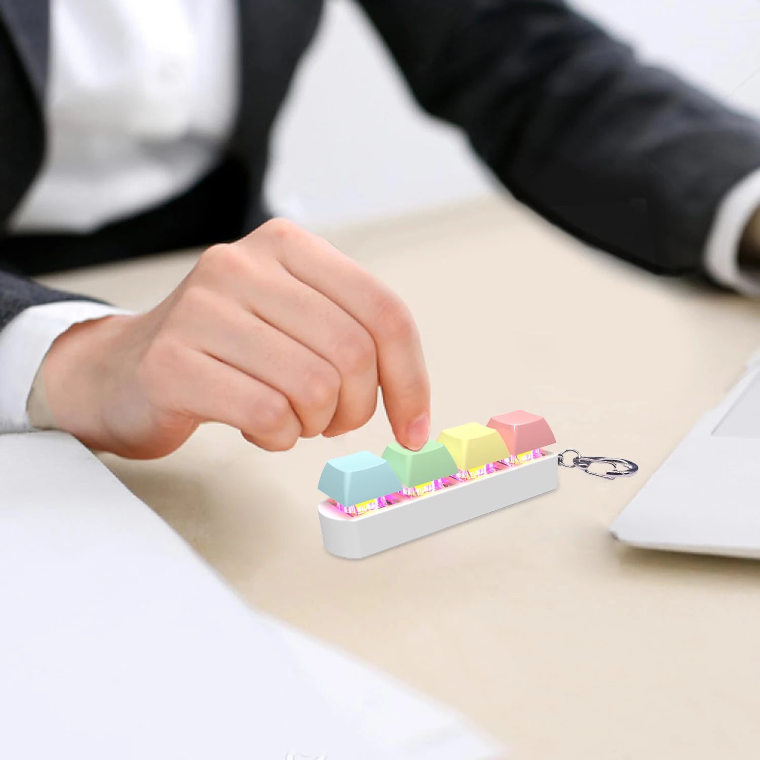 Four-button tactile stim tool designed for rhythmic regulation and anxiety relief