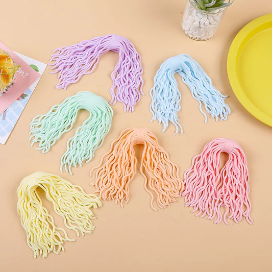 Stretchy sensory noodles in vibrant colours for tactile play and stress relief