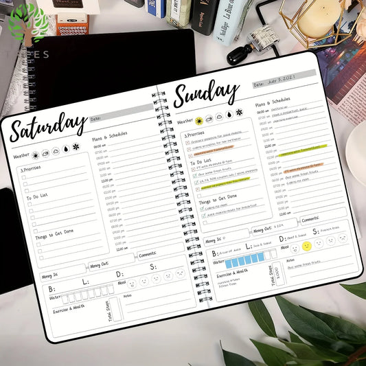 Weekly planner with daily schedule on a desk
