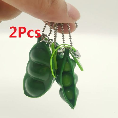 Green fidget toy in compact keychain format, ideal for neurodivergent-friendly sensory support.