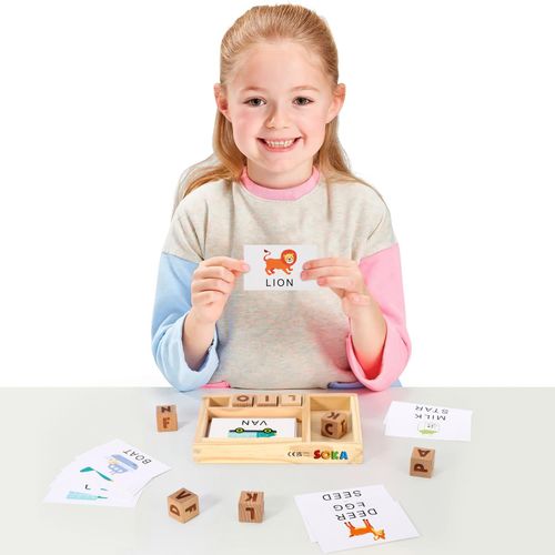 Child arranging wooden letter tiles on spelling board, promoting phonetic learning and executive function.