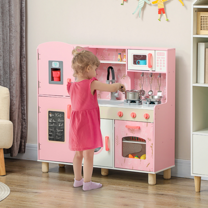 Child playing with a pink toy kitchen set in a room.