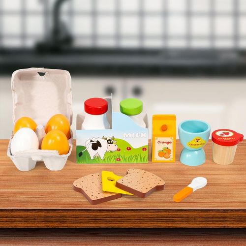 Set of toy food items including eggs, milk carton, juice box, toast, and utensils on a wooden surface.