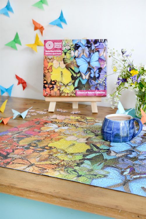 Completed jigsaw of butterflies and moths, ideal for neurodivergent adults seeking routine-led focus