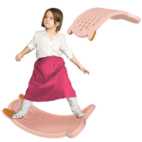 Child rocking on monster balance toy to build balance skills and gross motor confidence