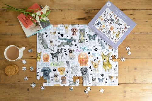 Completed puzzle with whimsical dog artwork supporting sensory-friendly mindfulness routines